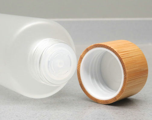 botella de vidrio esmerilado 150ml con la piel cosmética de bambú del cuidado de la bomba del envase de la loción