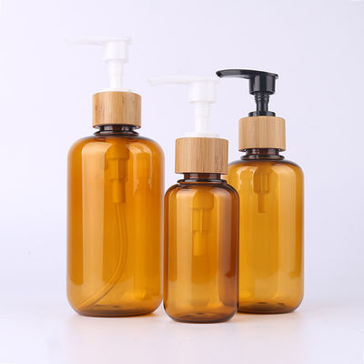 Amber Glass Bamboo Cosmetic Bottle con el rociador de madera de la loción del grabado del casquillo