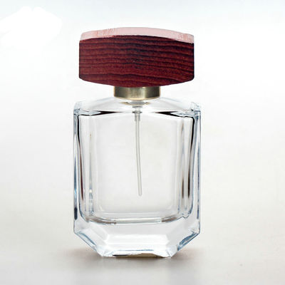 botella de perfume de cristal del claro 50ml con los casquillos de madera del collarwith del espray del casquillo y de la bomba