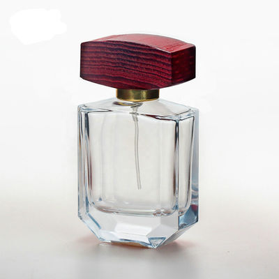 botella de perfume de cristal del claro 50ml con los casquillos de madera del collarwith del espray del casquillo y de la bomba