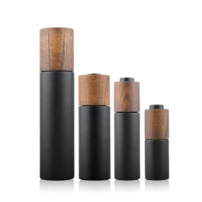 Nuevo casquillo de bambú de madera desarrollado alrededor de Violet Glass Bottle oscura con la bomba de la loción