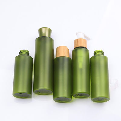 Empaquetado cosmético de bambú del skincare amistoso de Eco con la botella verde del ANIMAL DOMÉSTICO