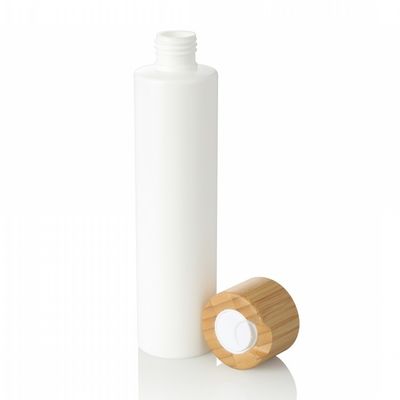 botella vacía del animal doméstico 300ml de la loción del uso cosmético plástico blanco de la crema con el casquillo de bambú