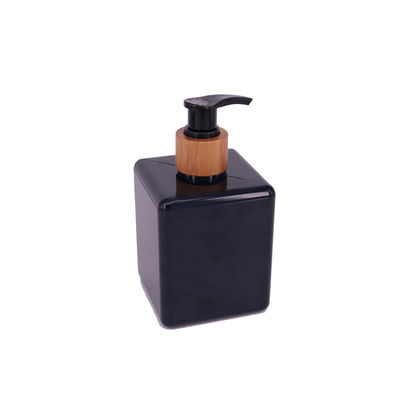 botella del baño del champú de la casilla negra 250ml con las botellas plásticas de la despedregadora de bambú de la bomba