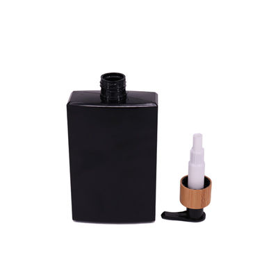 botella del baño del champú de la casilla negra 250ml con las botellas plásticas de la despedregadora de bambú de la bomba