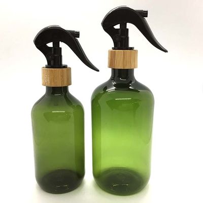 Botella plástica 500ml del ANIMAL DOMÉSTICO de la ronda de Boston con la botella de bambú del ANIMAL DOMÉSTICO de la polimerización en cadena del rociador del disparador