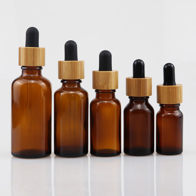 botella cosmética del vidrio del aceite esencial 100ml con la piel de bambú Brown del cuidado del dropper