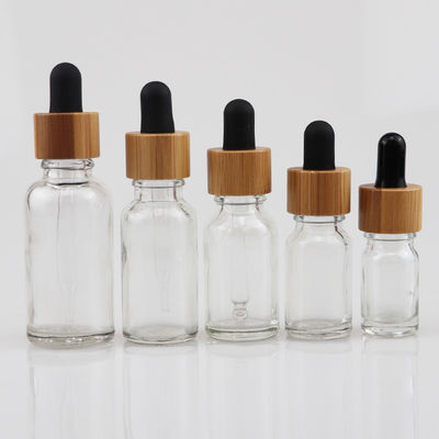 botella cosmética del vidrio del aceite esencial 100ml con la piel de bambú Brown del cuidado del dropper