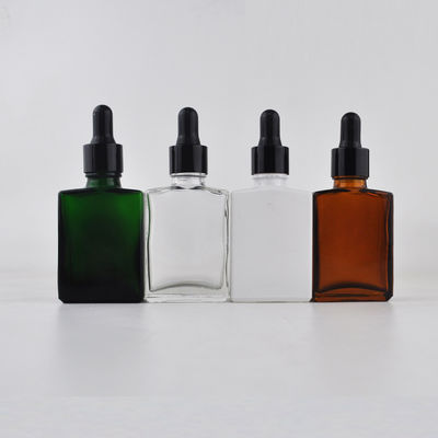 Botella de cristal cosmética del dropper 30ml del rectángulo con el casquillo de bambú para el aceite esencial
