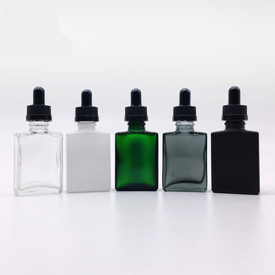 Botella de cristal cosmética del dropper 30ml del rectángulo con el casquillo de bambú para el aceite esencial