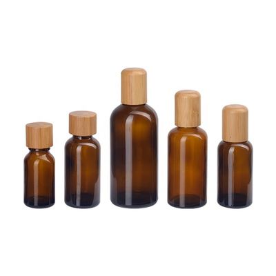 Botella de aceite esencial Brown cosmético vacío con el tapón de tuerca de madera de bambú de 18m m