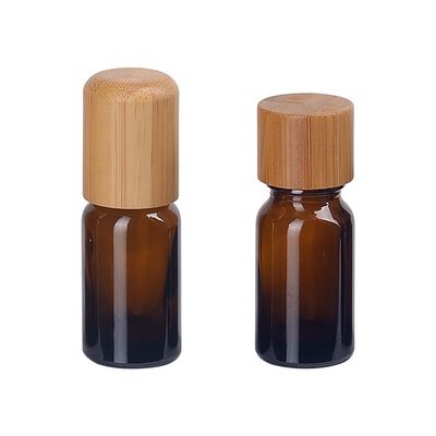 Botella de aceite esencial Brown cosmético vacío con el tapón de tuerca de madera de bambú de 18m m