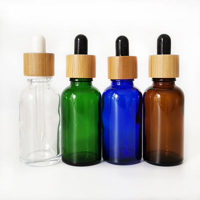 Botella de aceite esencial de cristal con la pequeña botella de aceite del dropper resistente de bambú del niño