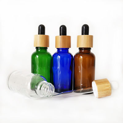 Botella de aceite esencial de cristal con la pequeña botella de aceite del dropper resistente de bambú del niño