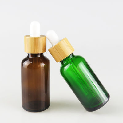 Botella de aceite esencial de cristal con la pequeña botella de aceite del dropper resistente de bambú del niño